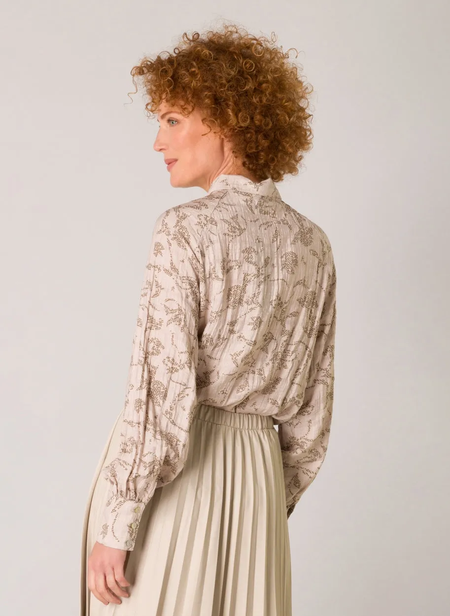 Chrissy Essential blouse features a soft